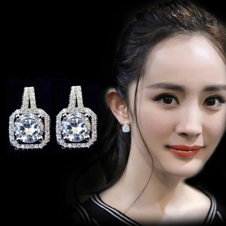 Aretes grandes de mujer con diamantes cuadrados