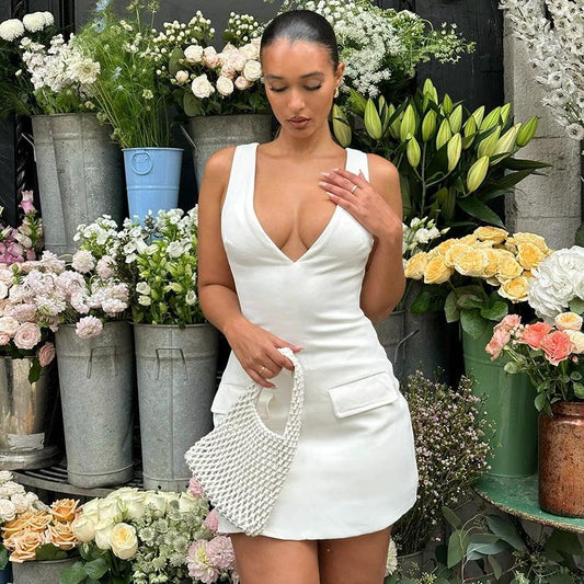 Vestido de mujer entallado liso sin mangas y con espalda descubierta