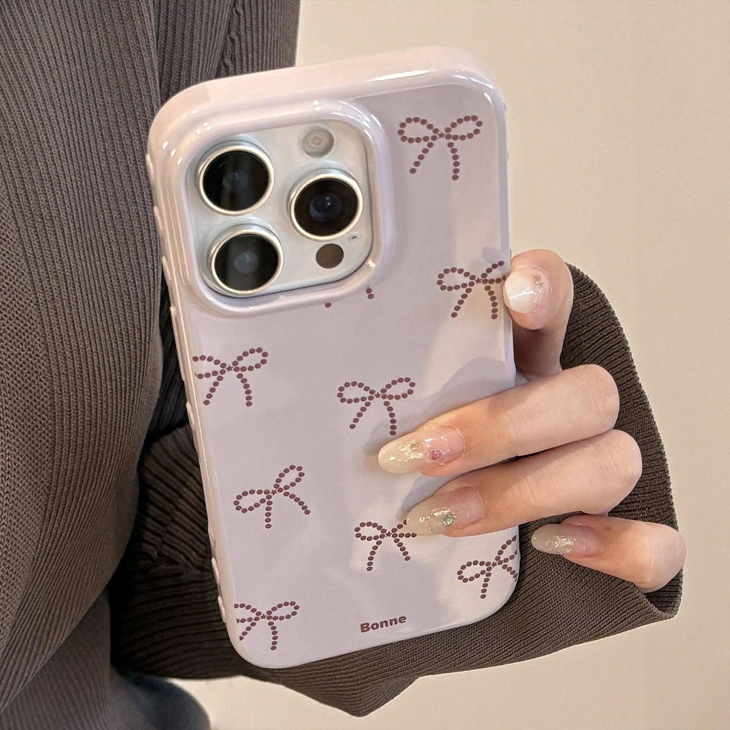 Funda de móvil ins viento lazo gris morado manzana 17pro max iphone15 adecuada para 14 soporte dorado 16 blando