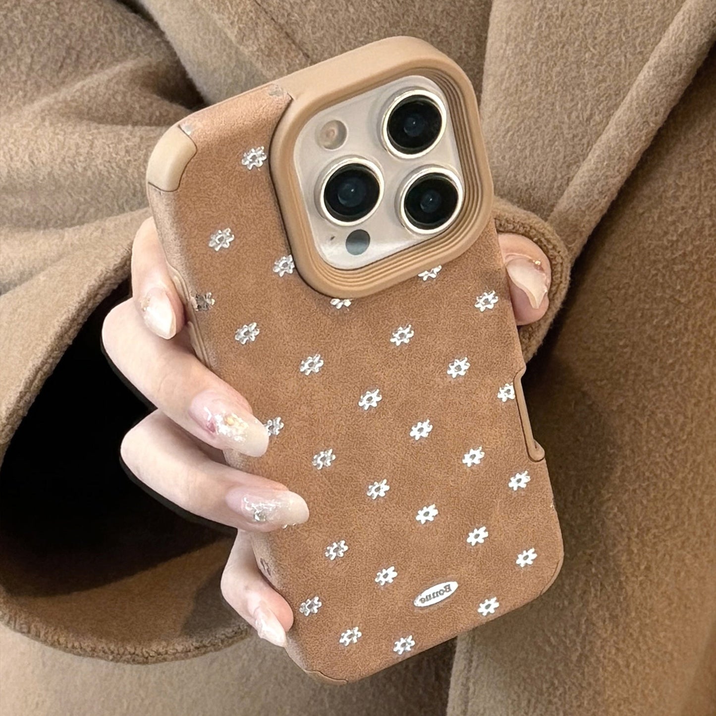 Adecuado para iPhone 17 Apple 16promax Funda para teléfono móvil 15 otoño e invierno felpa marrón 14 gamuza 13 anticaída