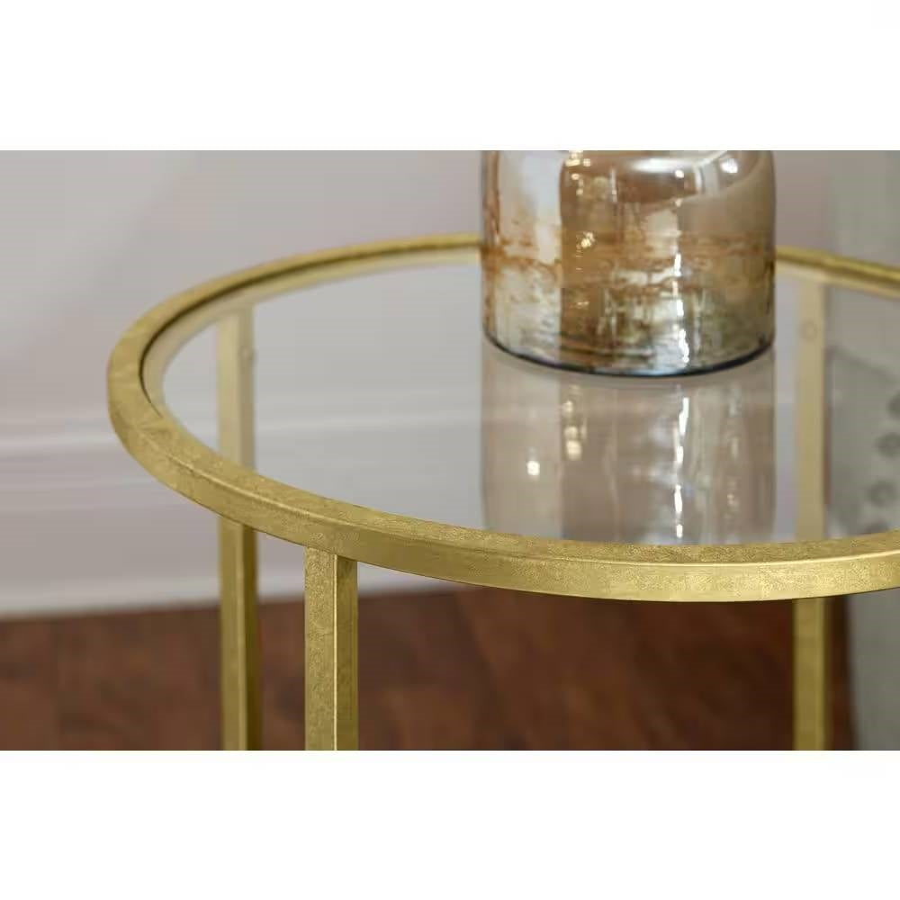 Mesa auxiliar redonda con acento, de metal dorado y cristal, con estante inferior