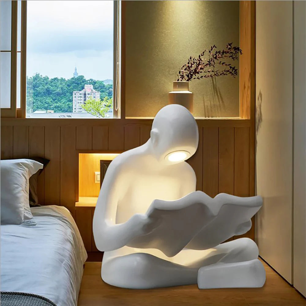 Lámpara de pie Escultura Humana Leyendo
