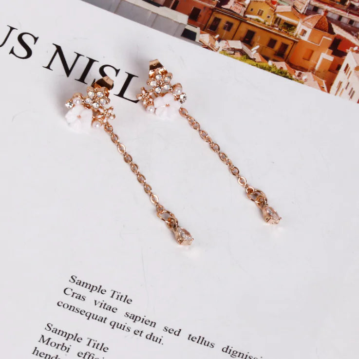 Pendientes largos de copo de nieve con diamantes de imitación y pines de plata 925