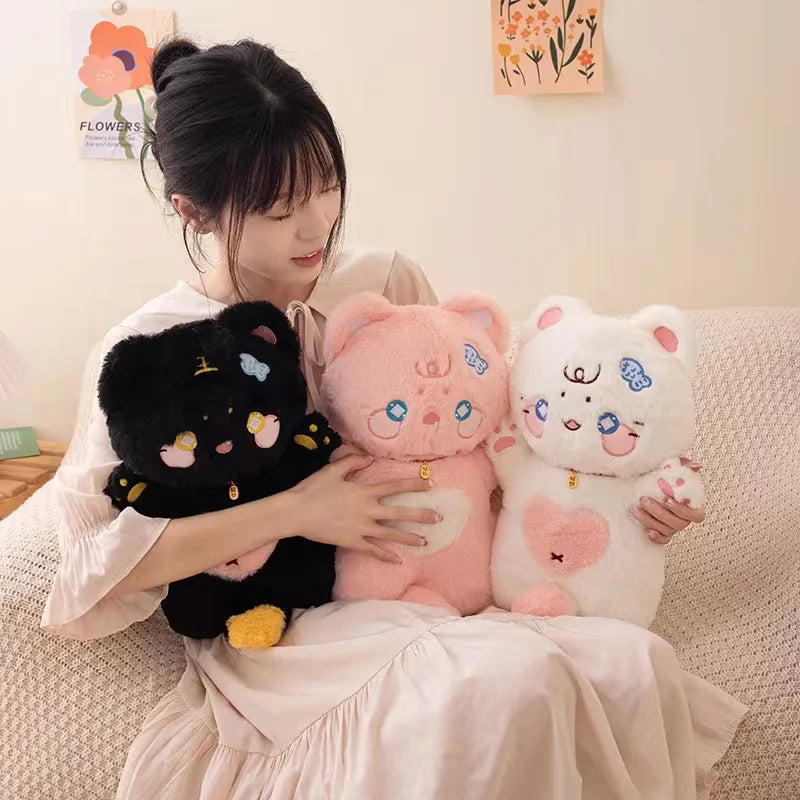 Tiernos peluches de gato