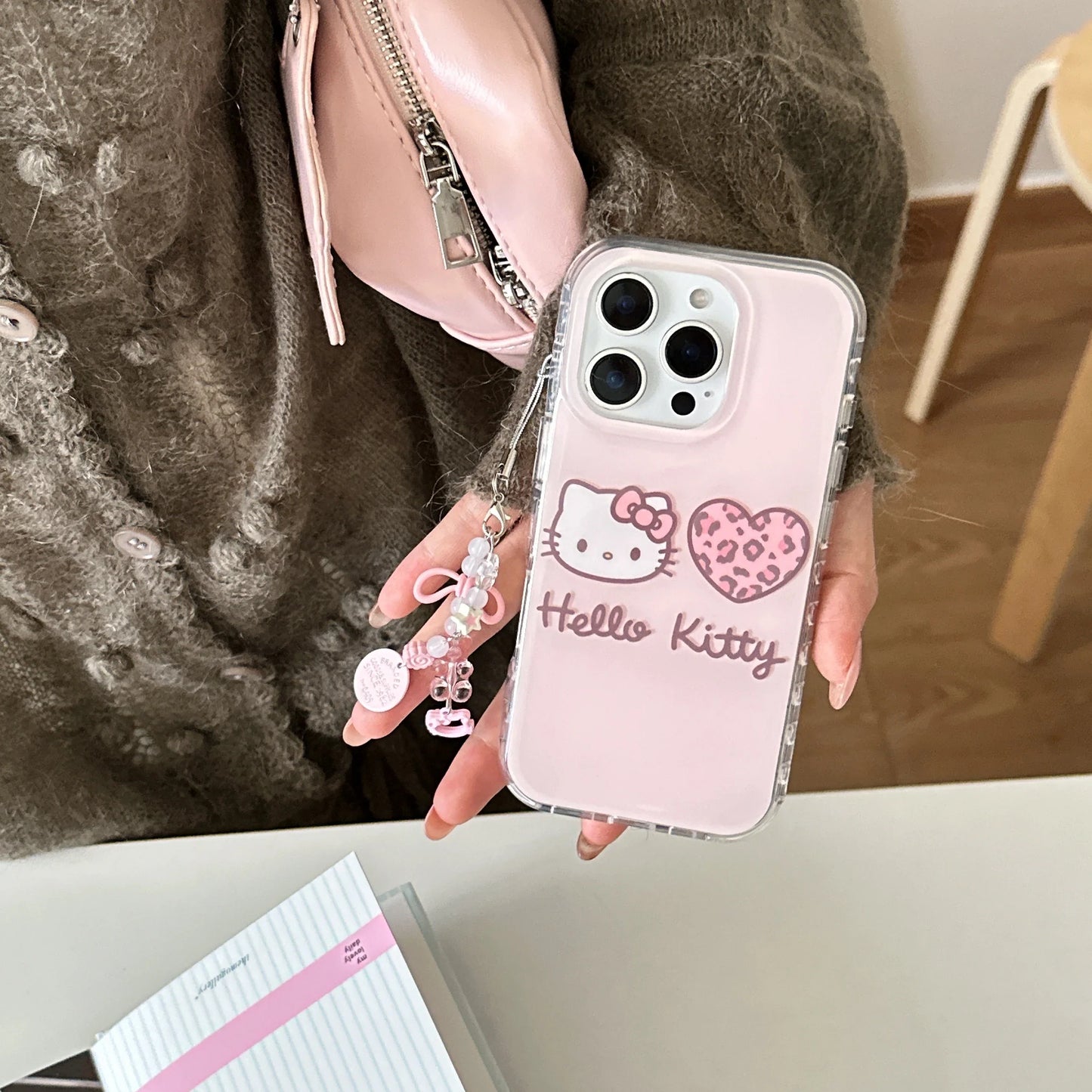 Bonita funda de teléfono Hello Kitty con estampado de leopardo rosa IMD para iPhone
