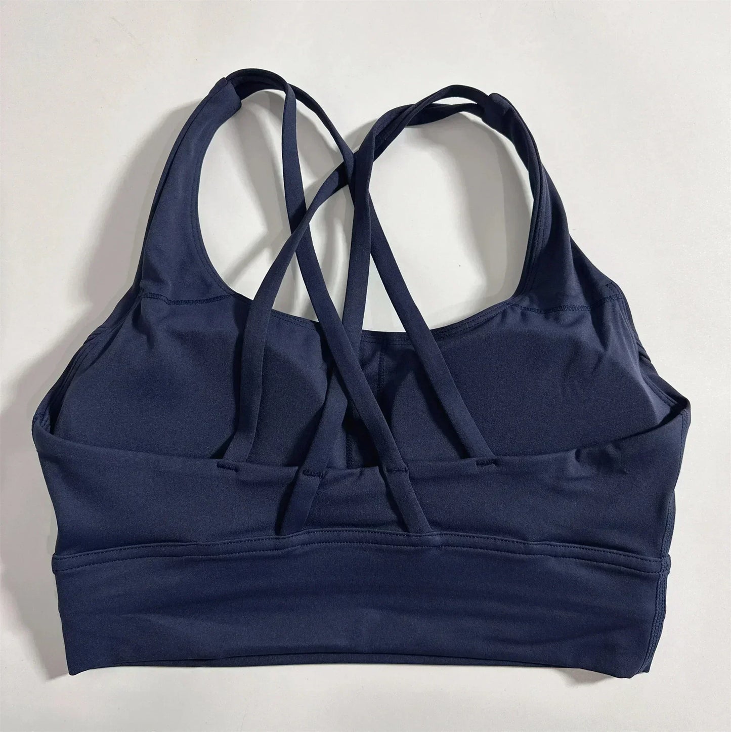 Sujetador deportivo para mujer de color liso, de punto cruzado, suave y de alta resistencia, top ajustado para entrenamiento completo, gimnasio, yoga, ropa interior con almohadillas para el pecho