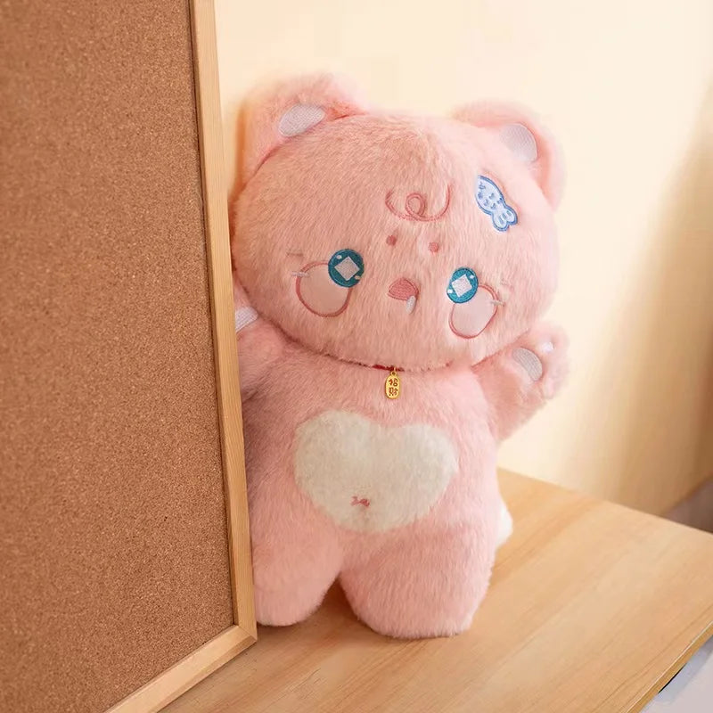 Tiernos peluches de gato