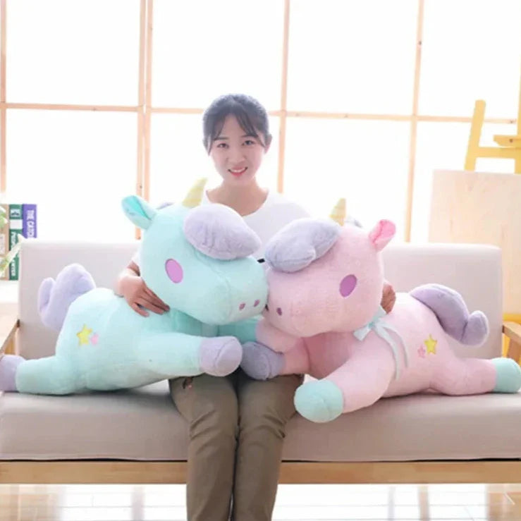 Peluche de unicornio en tonos pastel