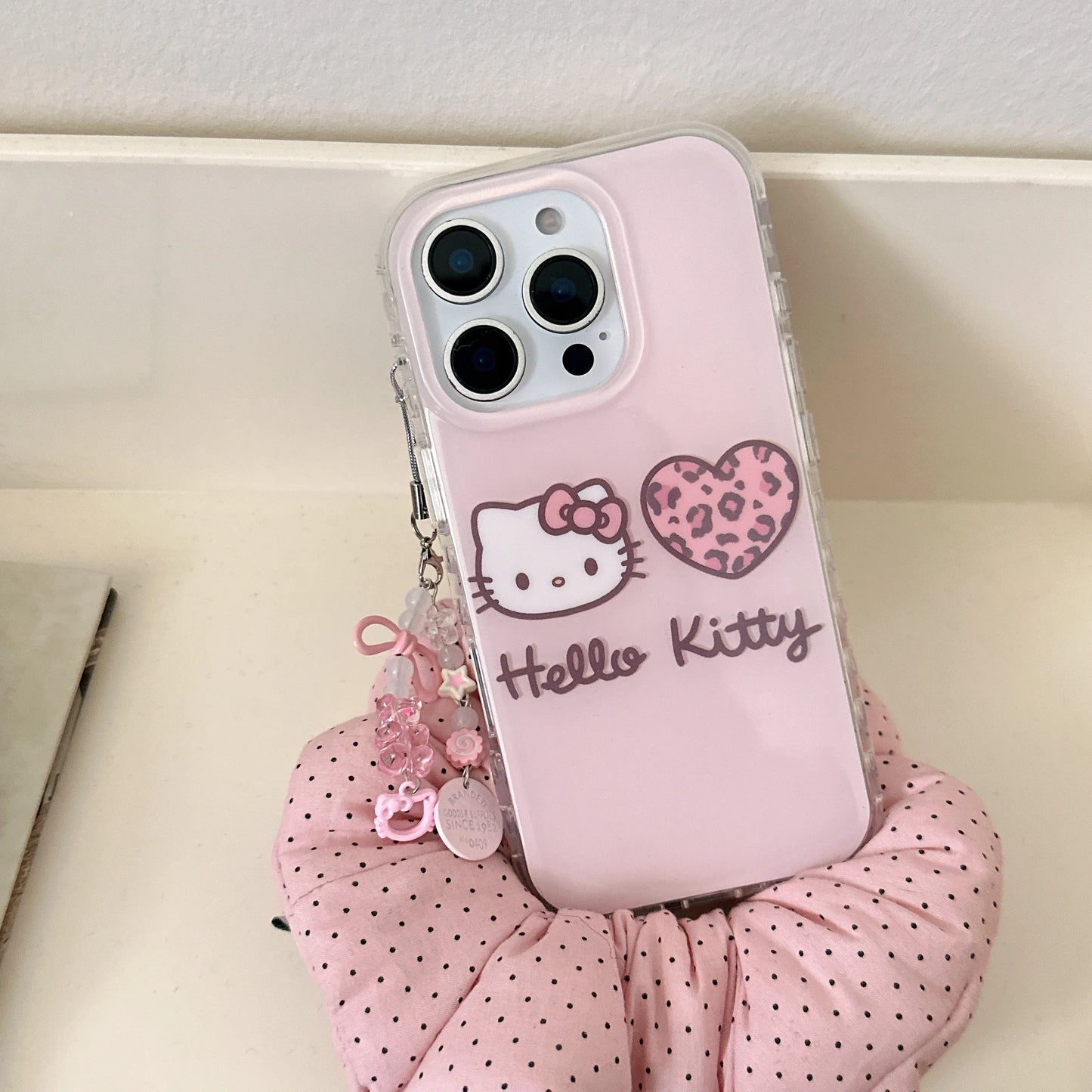 Bonita funda de teléfono Hello Kitty con estampado de leopardo rosa IMD para iPhone