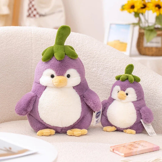 Peluches adorables de berenjena pingüino