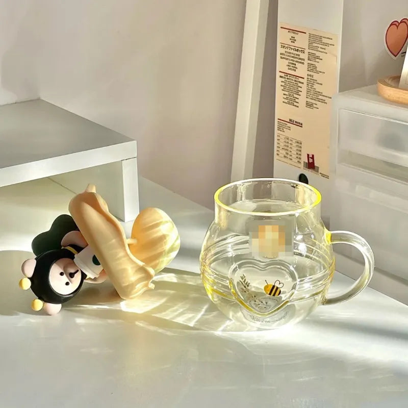 Taza infusora de té con diseño de oso y miel