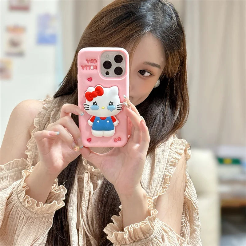 Funda de teléfono de silicona suave con soporte telescópico de dibujos animados 3D de Kawaii Cry Hello Kitty para iPhone