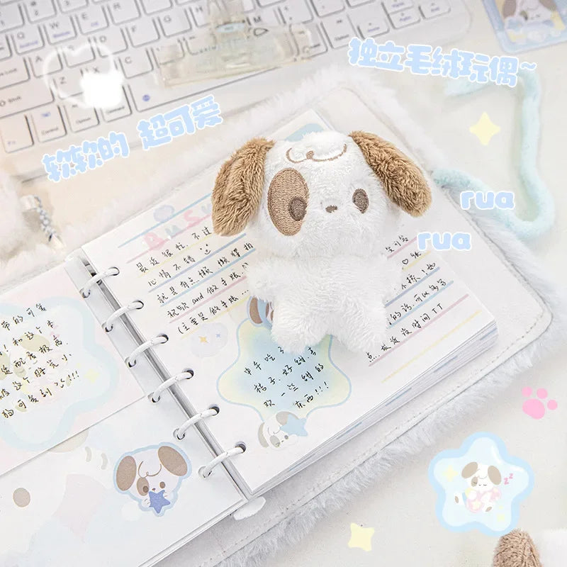 Cuaderno de peluche con perrito y gato dormilones