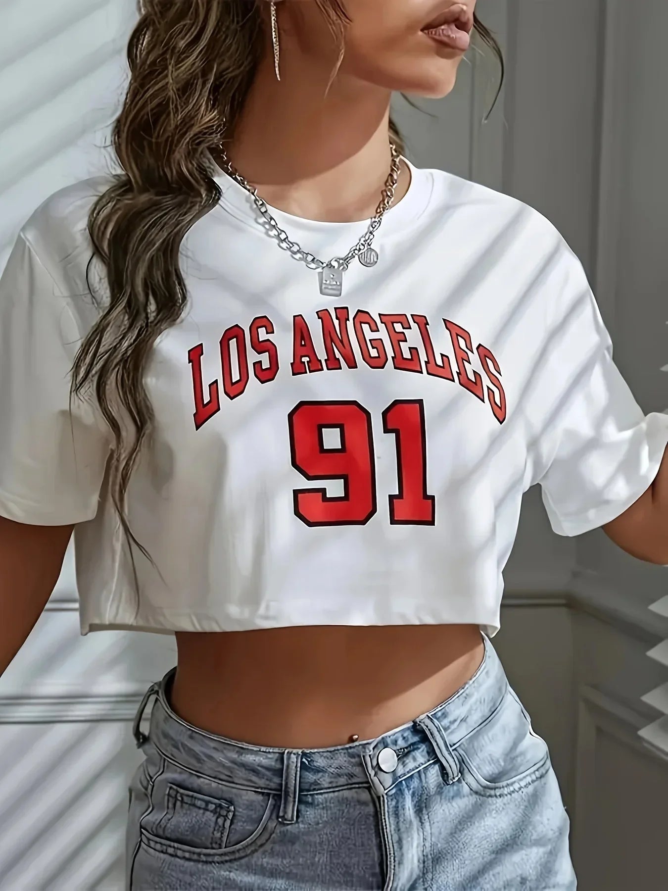 Camiseta corta deportiva de cuello redondo con gráfico Los Angeles Número 91