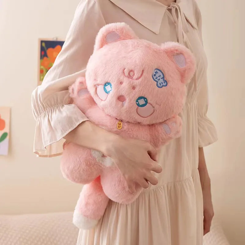 Tiernos peluches de gato