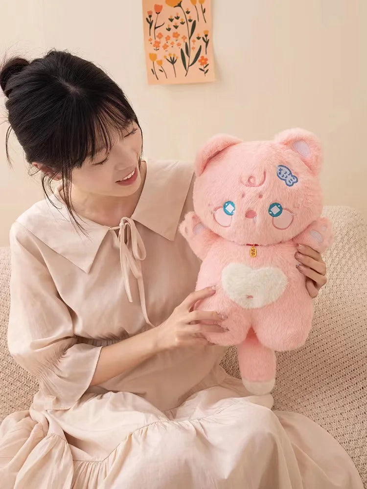 Tiernos peluches de gato