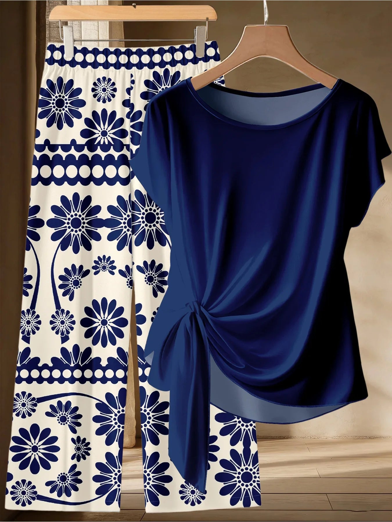 Summer Women's Plus Size Casual Loose Two-Piece Set Solid Color Twisted T-Shirt + Blue and White Printed Wide Leg Pants Set