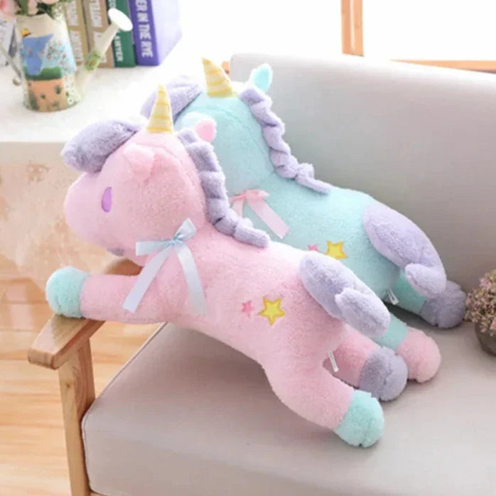 Peluche de unicornio en tonos pastel