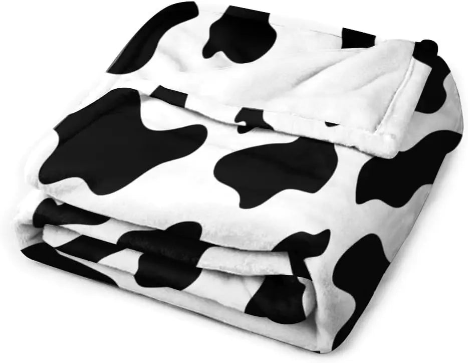 Manta de Franela Estampado de Vaca