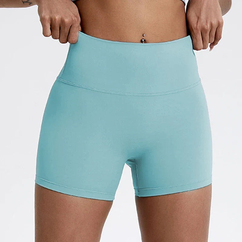 Pantalones cortos de gimnasio tipo leggings con efecto push-up para glúteos de mujer