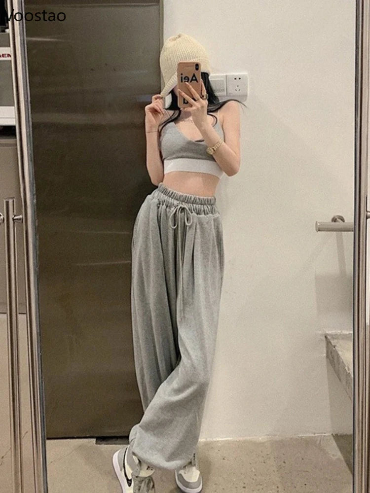Elegantes joggers blancos tobilleros para mujer