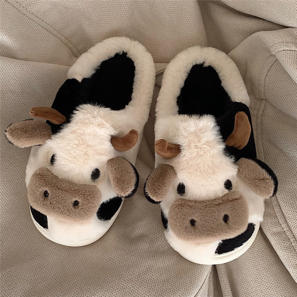 Pantuflas de vaca peludas