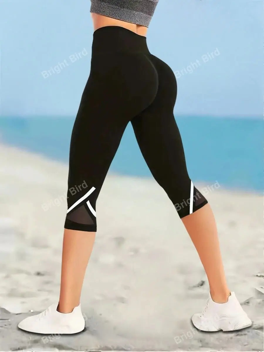 Pantalones de yoga de talle alto con malla
