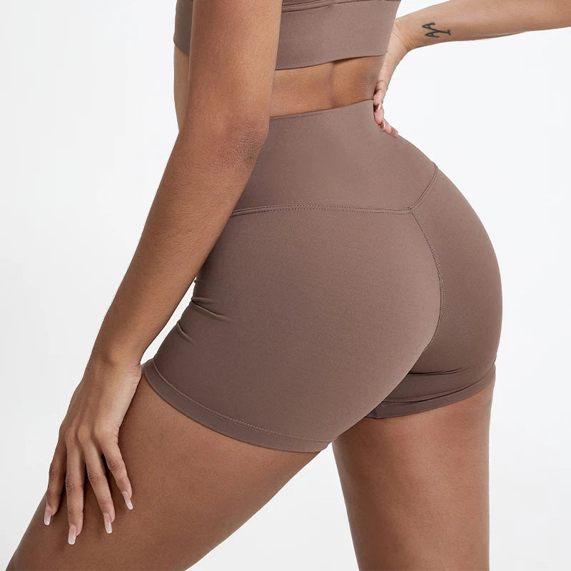 Pantalones cortos de gimnasio tipo leggings con efecto push-up para glúteos de mujer