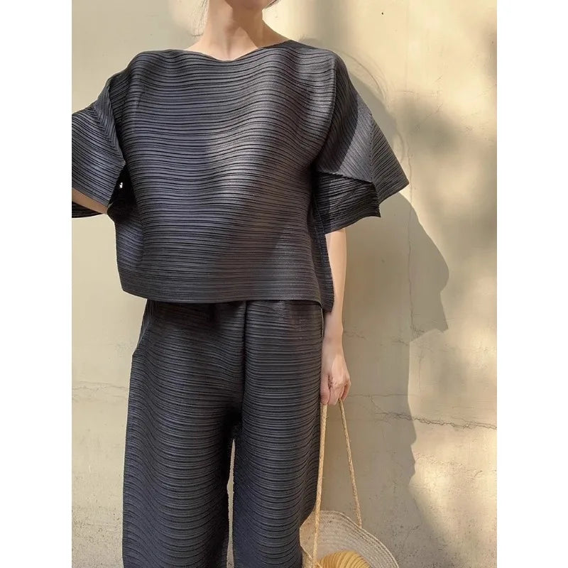 YUDX Miyake Pleated Women 2 Piece Fashion New Bubble Sleeve Round Neck Short Sleeve Loose Top + Irregular Pants Set