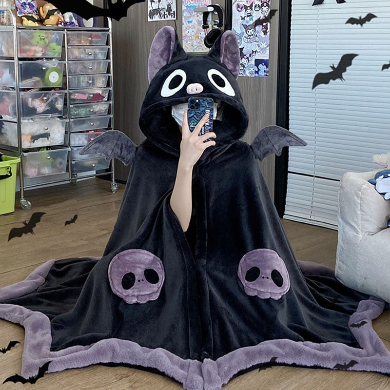 Capa de murciélago de peluche
