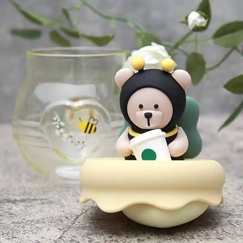 Taza infusora de té con diseño de oso y miel
