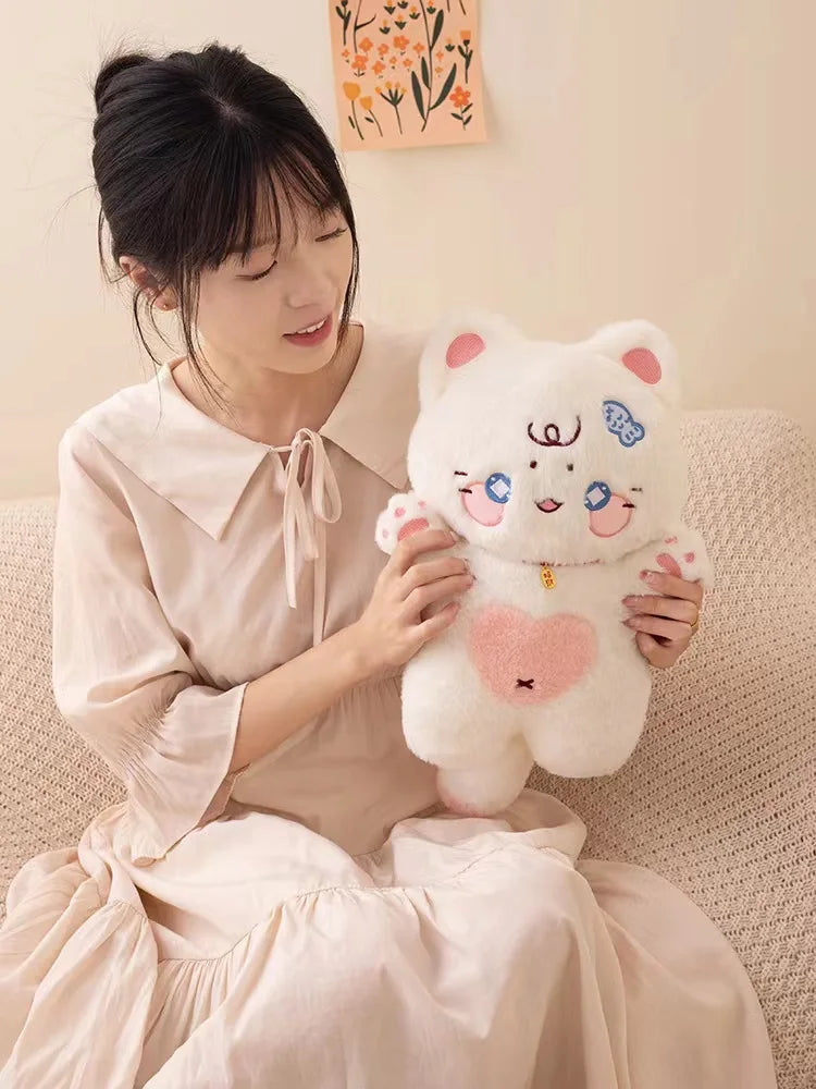 Tiernos peluches de gato
