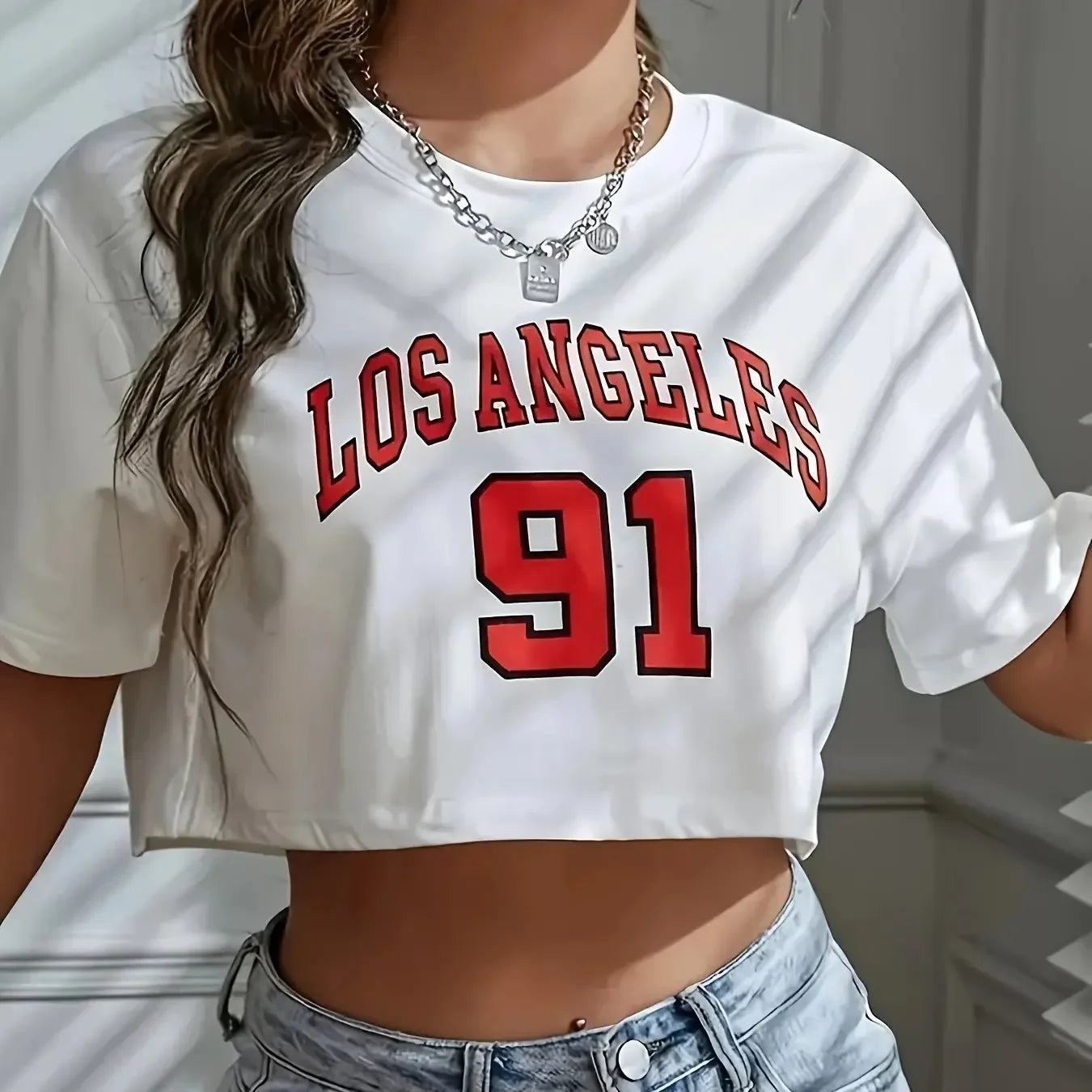 Camiseta corta deportiva de cuello redondo con gráfico Los Angeles Número 91