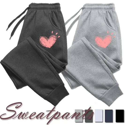 Pantalones de chándal bonitos con estampado de corazón para mujer