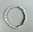 Pulsera de cuentas de hematita – Gunmetal, oro y plata (muñecas medianas-grandes)