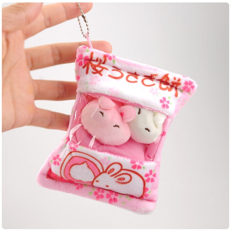 Llavero de bolsa de pudín de conejitos de peluche