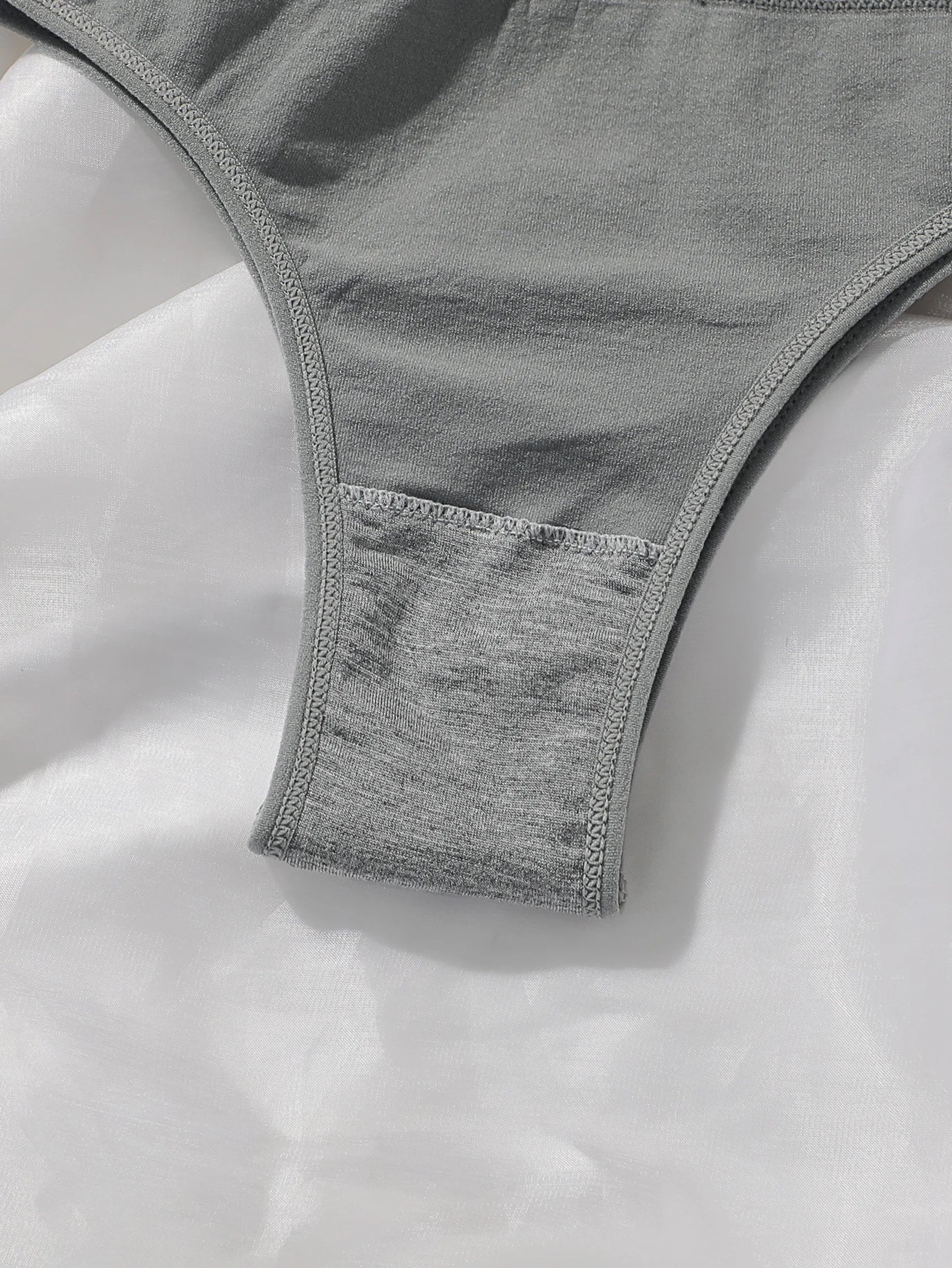 Women's sexy solid color triangle pants with no trace low waist hollow out easy to wash and dry underwear Z626