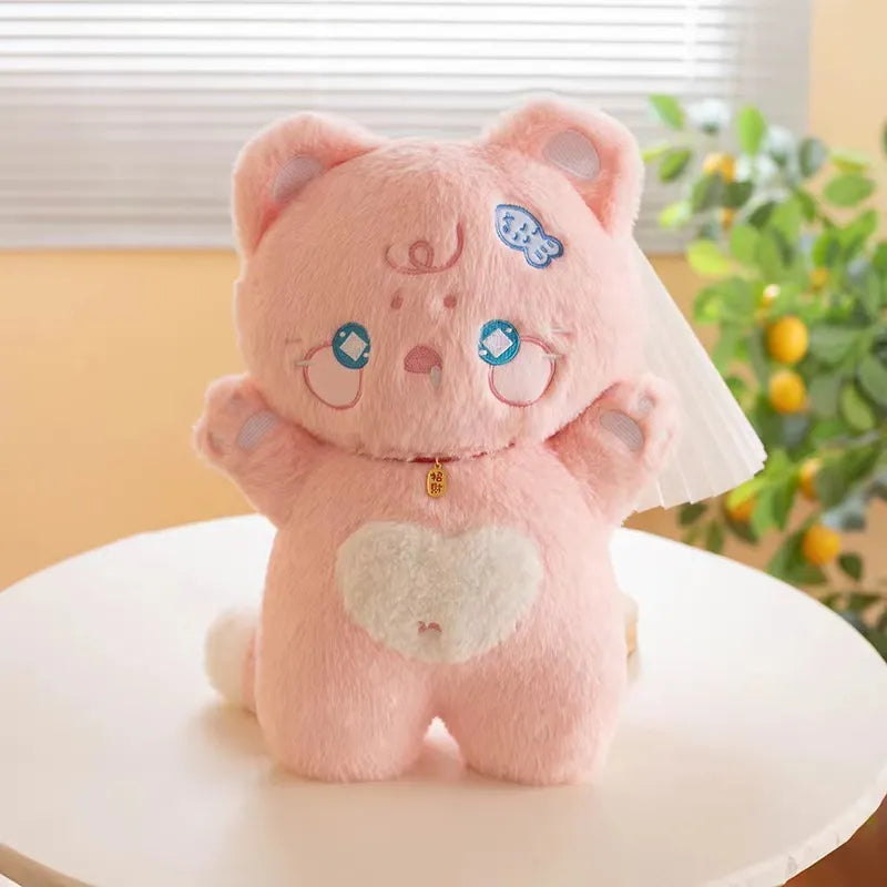 Tiernos peluches de gato