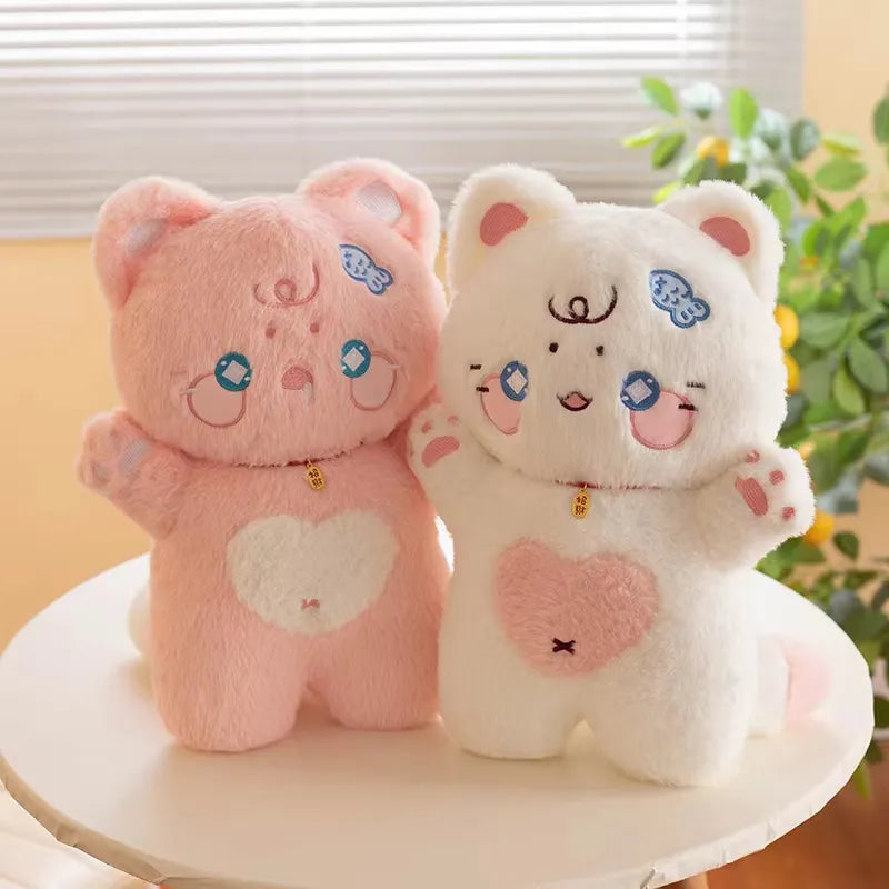 Tiernos peluches de gato