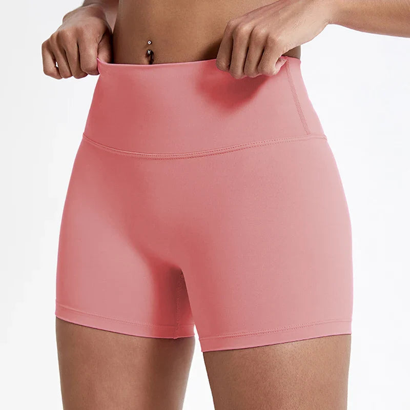 Pantalones cortos de gimnasio tipo leggings con efecto push-up para glúteos de mujer