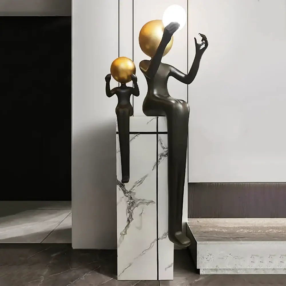 Lámpara de pie Escultura Doble Figura Sentada