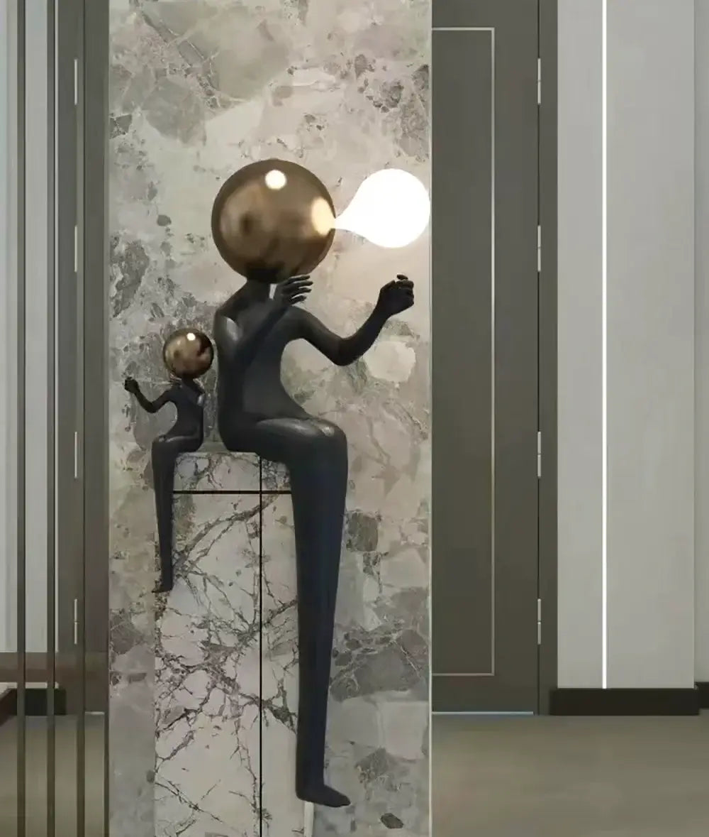 Lámpara de pie Escultura Doble Figura Sentada