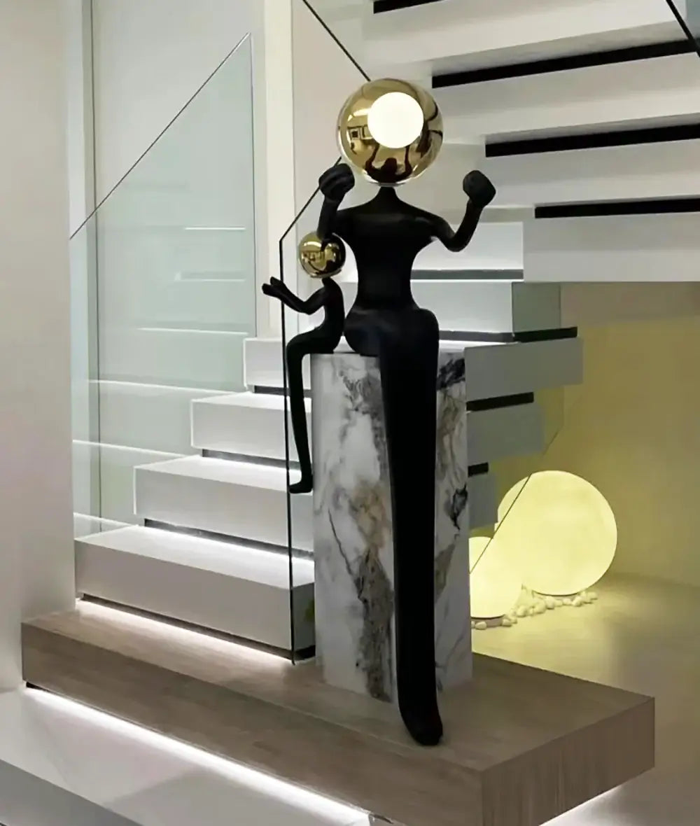 Lámpara de pie Escultura Doble Figura Sentada