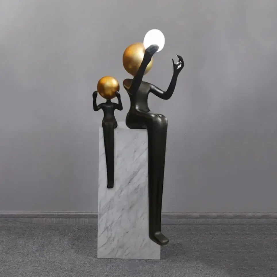 Lámpara de pie Escultura Doble Figura Sentada