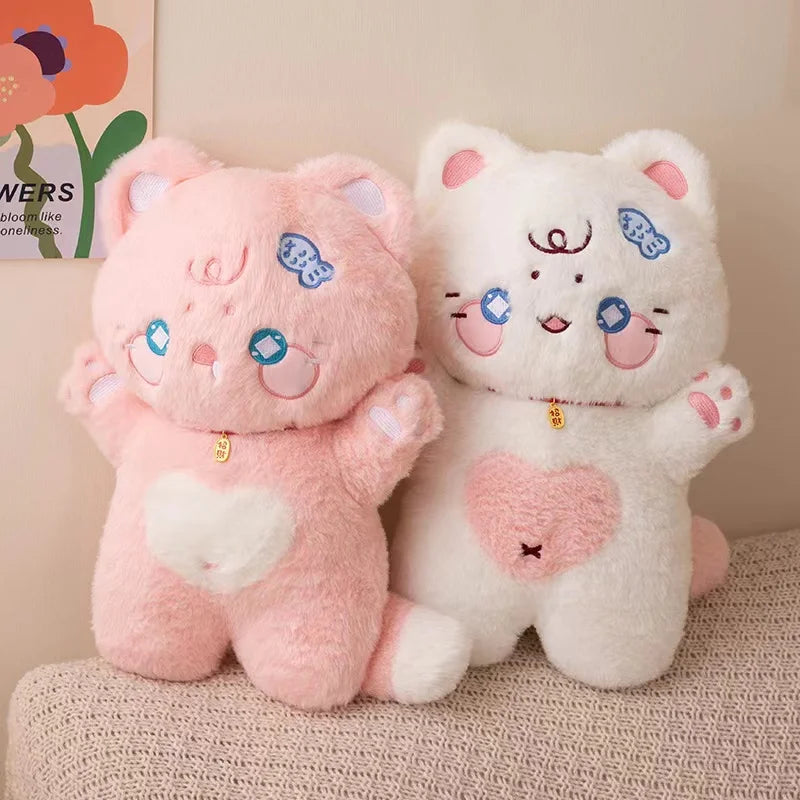 Tiernos peluches de gato
