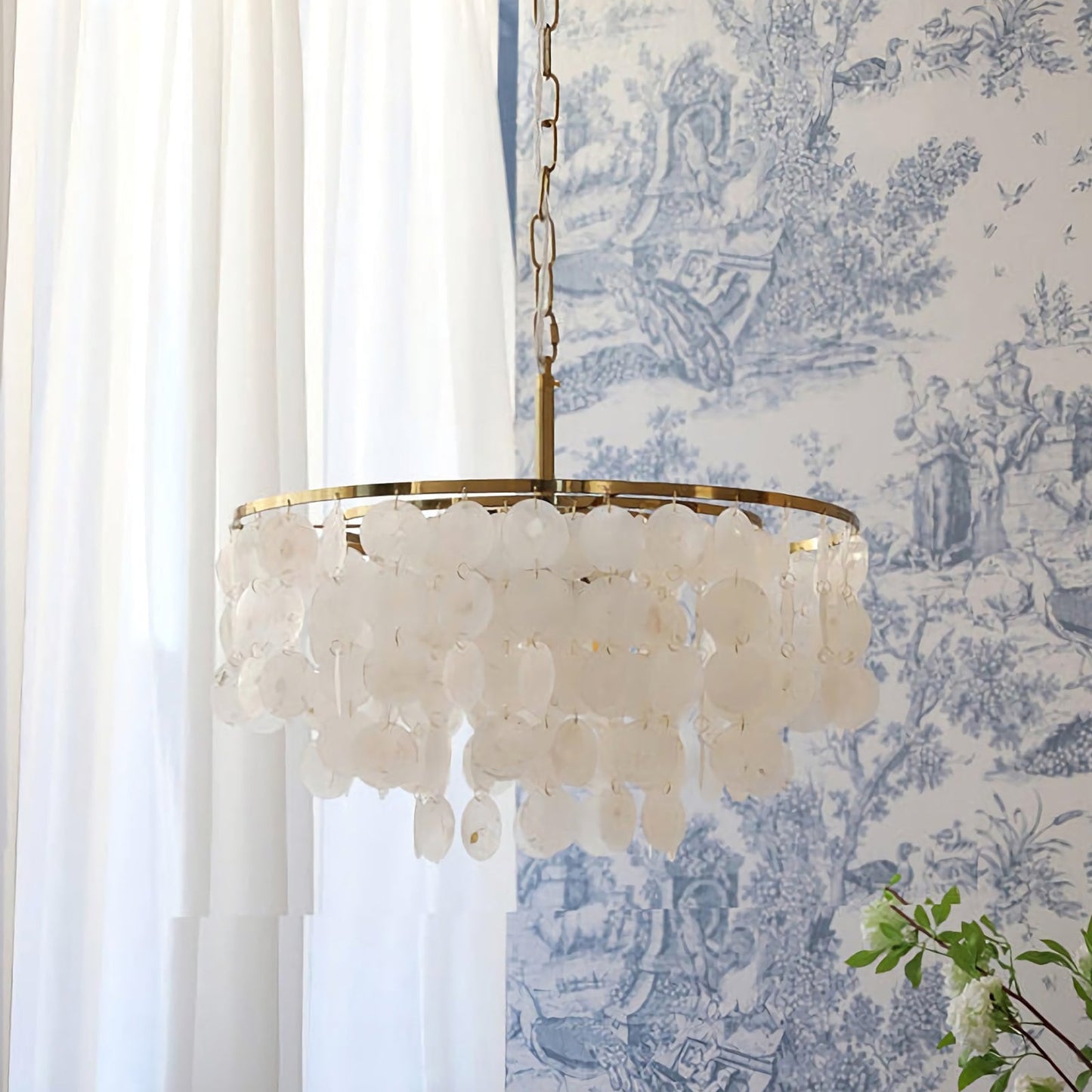 Candelabro de caracolas de viento