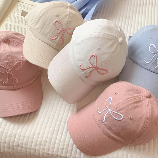 Gorra de béisbol con dulce moño bordado