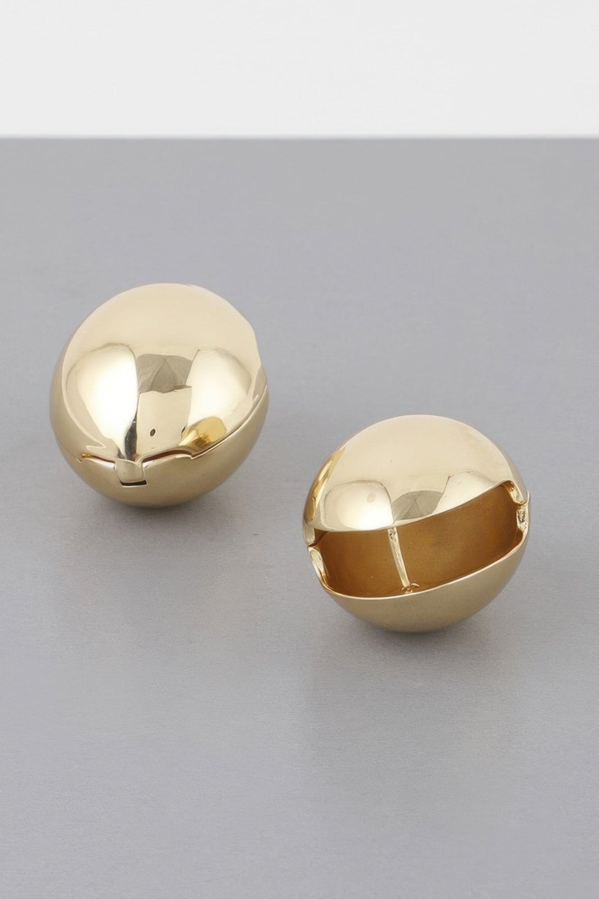 TRIBECA Empty Shell Clasp Earrings: NYFW BYMANYC ® New York