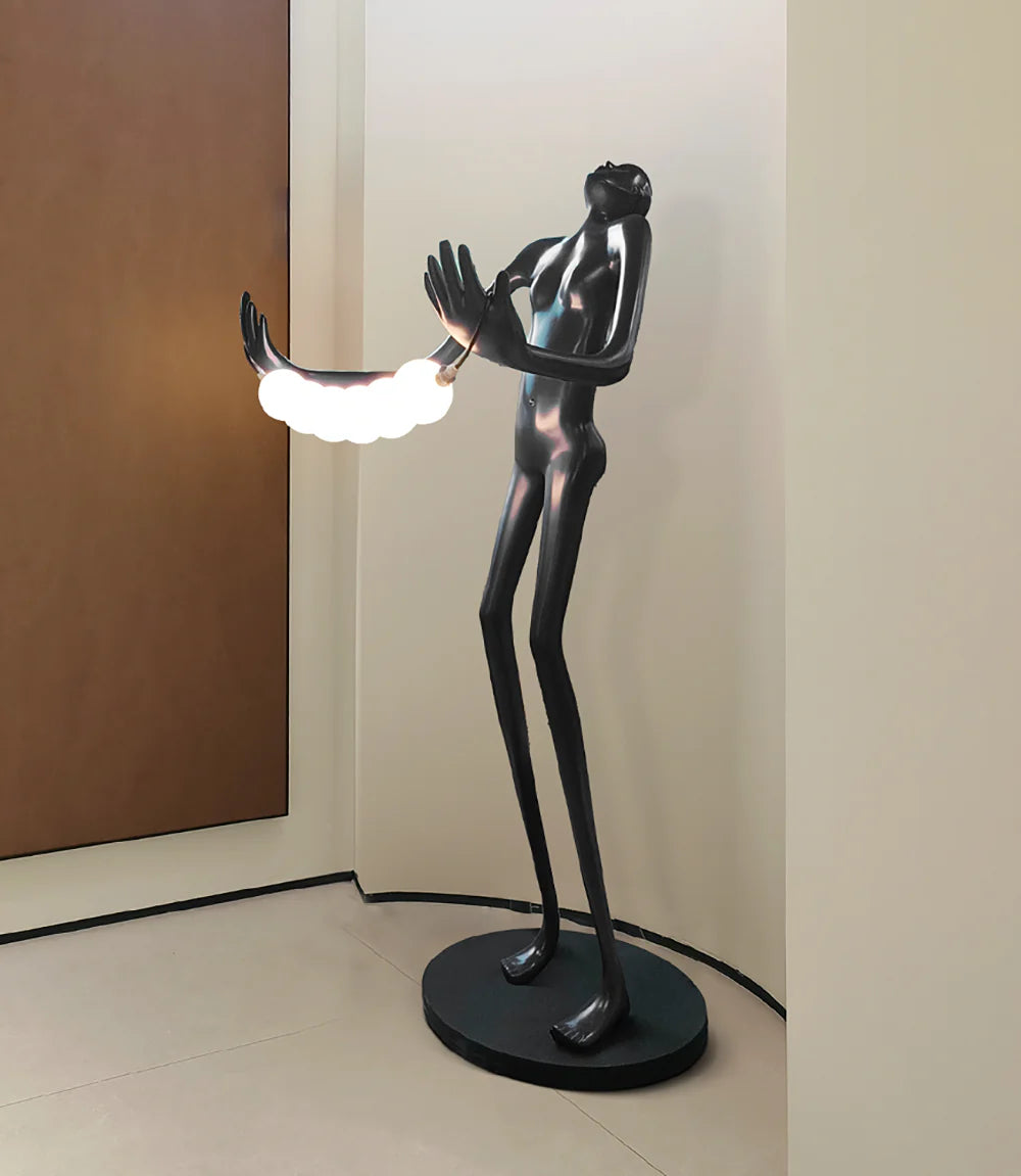 Lámpara de pie de escultura humana con cabeza inclinada