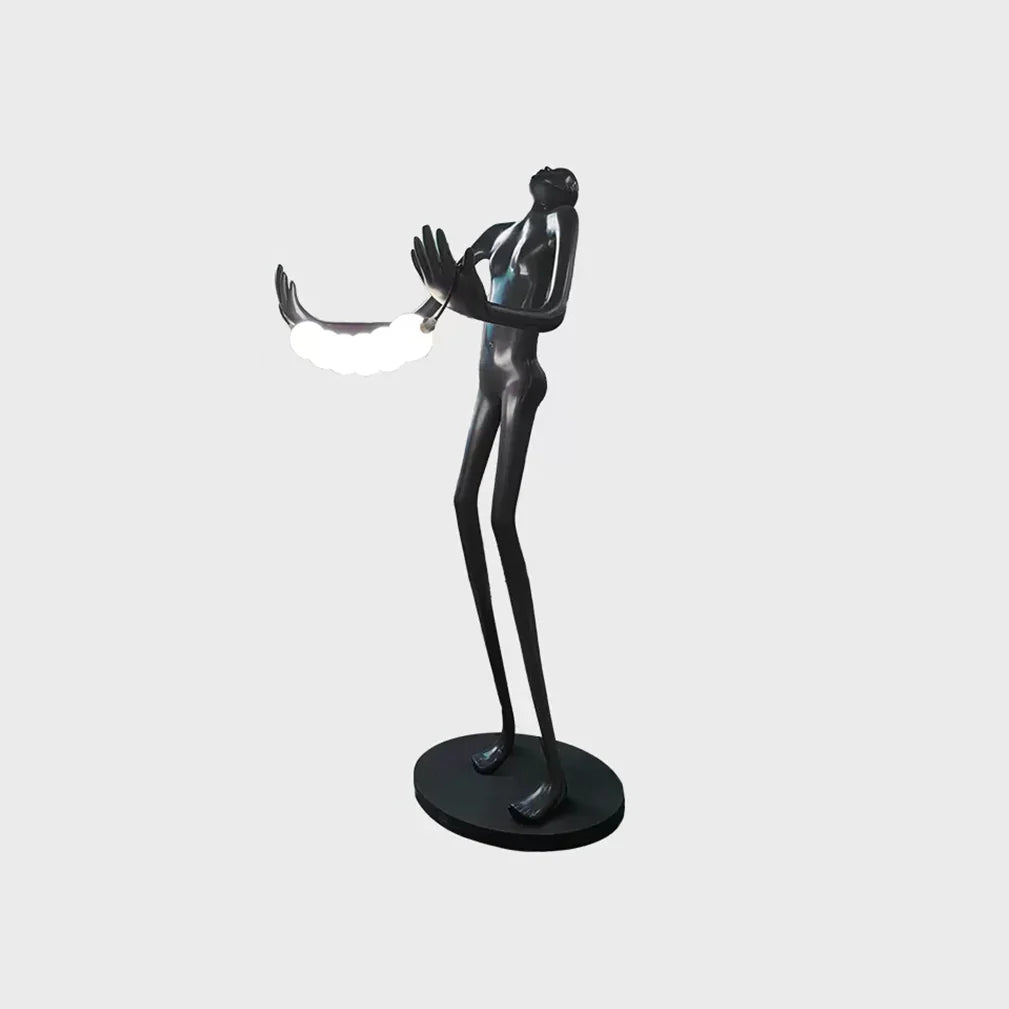 Lámpara de pie de escultura humana con cabeza inclinada